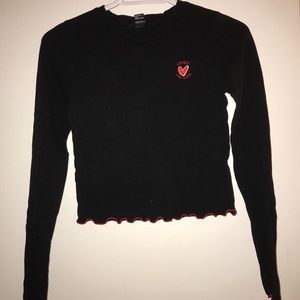 Small black long sleeved shirt